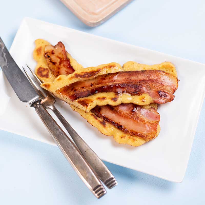 Keto Bacon Pancakes on a white plate.