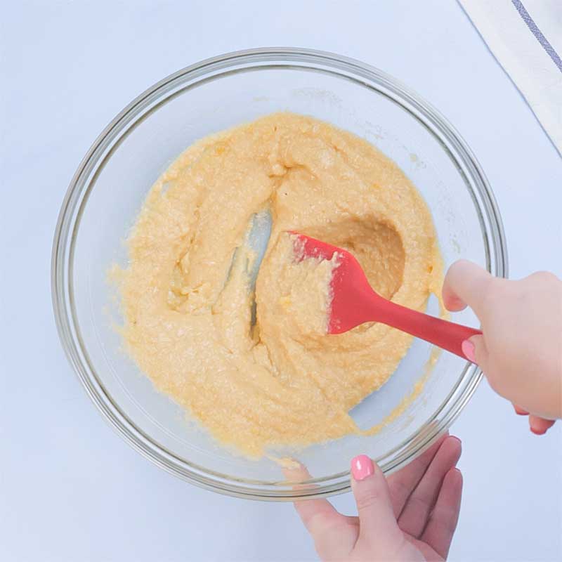 Keto Bacon Pancakes Ingredients being mixed in a bowl.