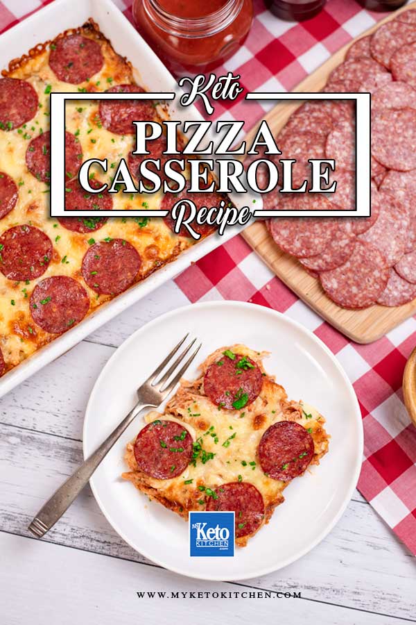 A serve of Keto Chicken Pizza Casserole on a plate with the full casserole dish in the background.