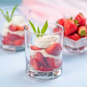Low Carb Strawberries Romanoff served in glasses.