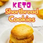 Three keto shortbread cookies stacked on top of one another.