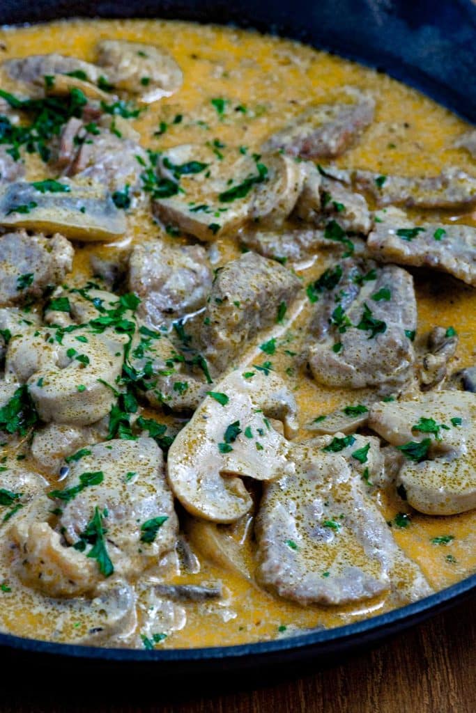 Keto beef stroganoff in a cast iron pan.
