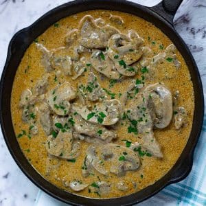 beef stroganoff in a cast iron pan
