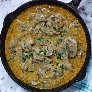beef stroganoff in a cast iron pan