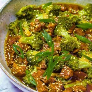 Keto beef and broccoli in a grey bowl.