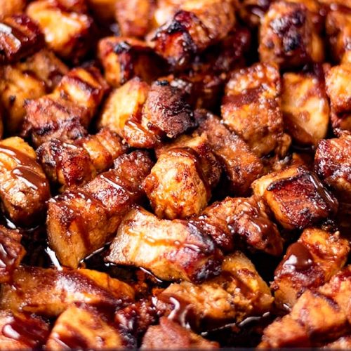 The best pork belly bites in a tray.