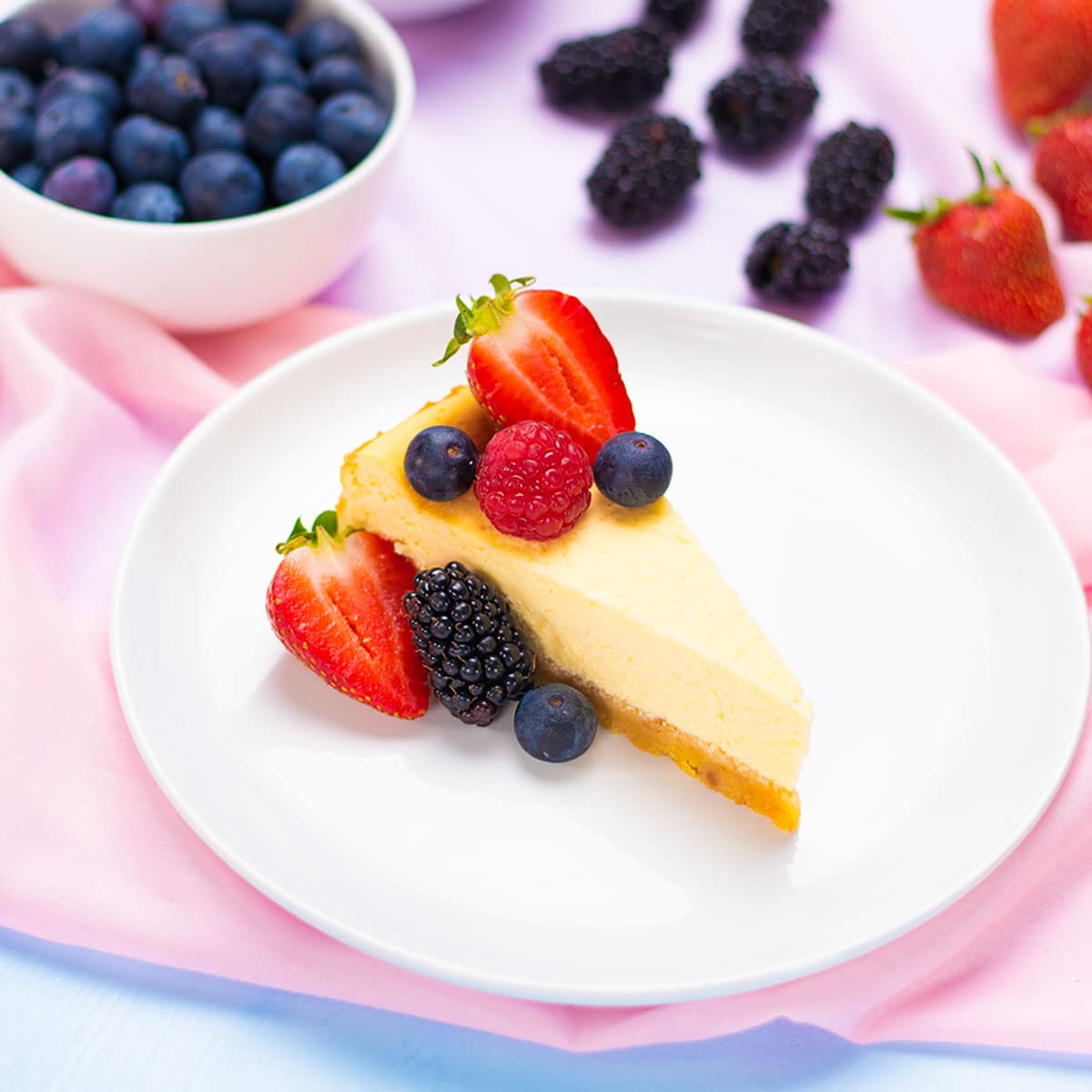 Keto cheesecake slice on a plate.