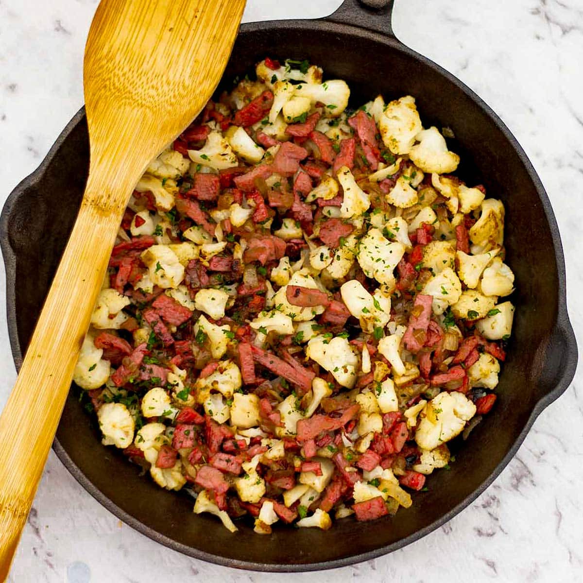 Keto corned beef hash in a cast iron skillet