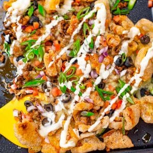 Keto nachos on a baking tray.