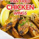 Chicken wings in a baking tin.