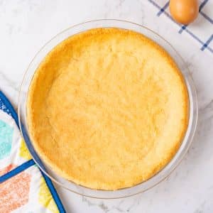 Keto pie crust in a pie dish.