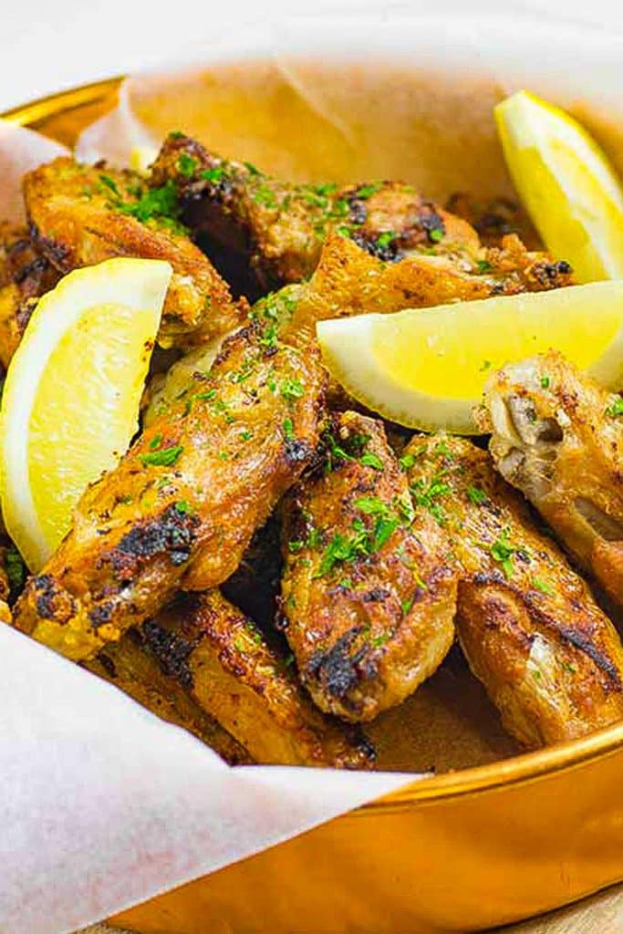 Chicken wings in a baking tin.