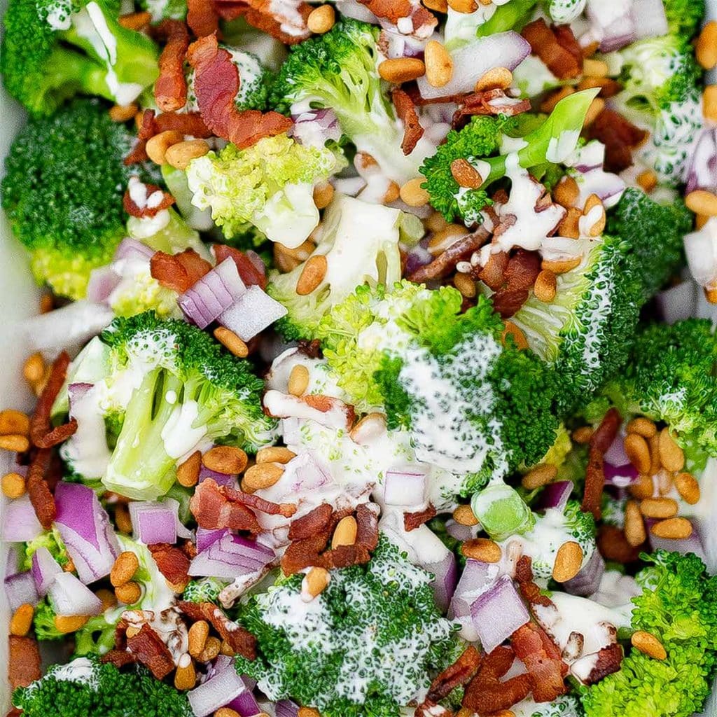 Keto broccoli salad with dressing on top.