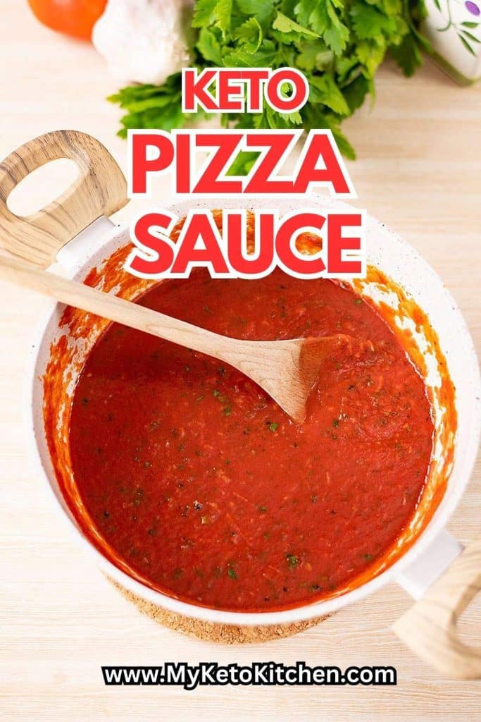 Keto pizza marinara sauce in a pan.