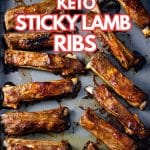 Keto sticky lamb ribs o a baking tray with text saying, "keto sticky lamb ribs."