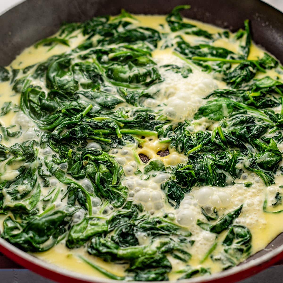Keto creamed spinach in a frying pan