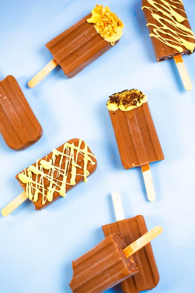 Keto ice cream bars on a blue background.