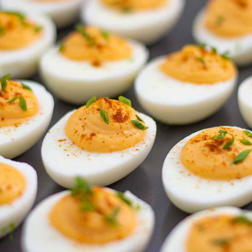 Keto deviled eggs on a serving tray.