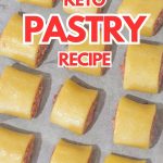 Keto sausage rolls pastry on a baking tray with baking paper.