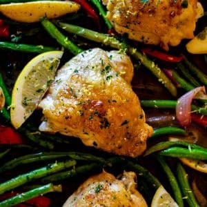 Keto lemon chicken thighs on a sheet pan.