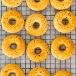 12 keto donuts on a cooling rack.