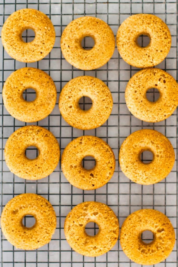 Keto donuts on a cooling rack.