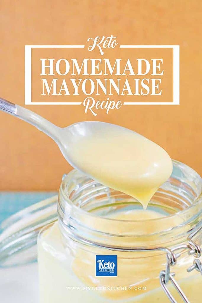 Spoon full of keto mayonnaise from a mason jar.