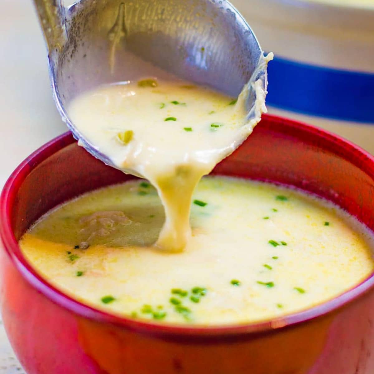 Keto cream of chicken soup in a red bowl.